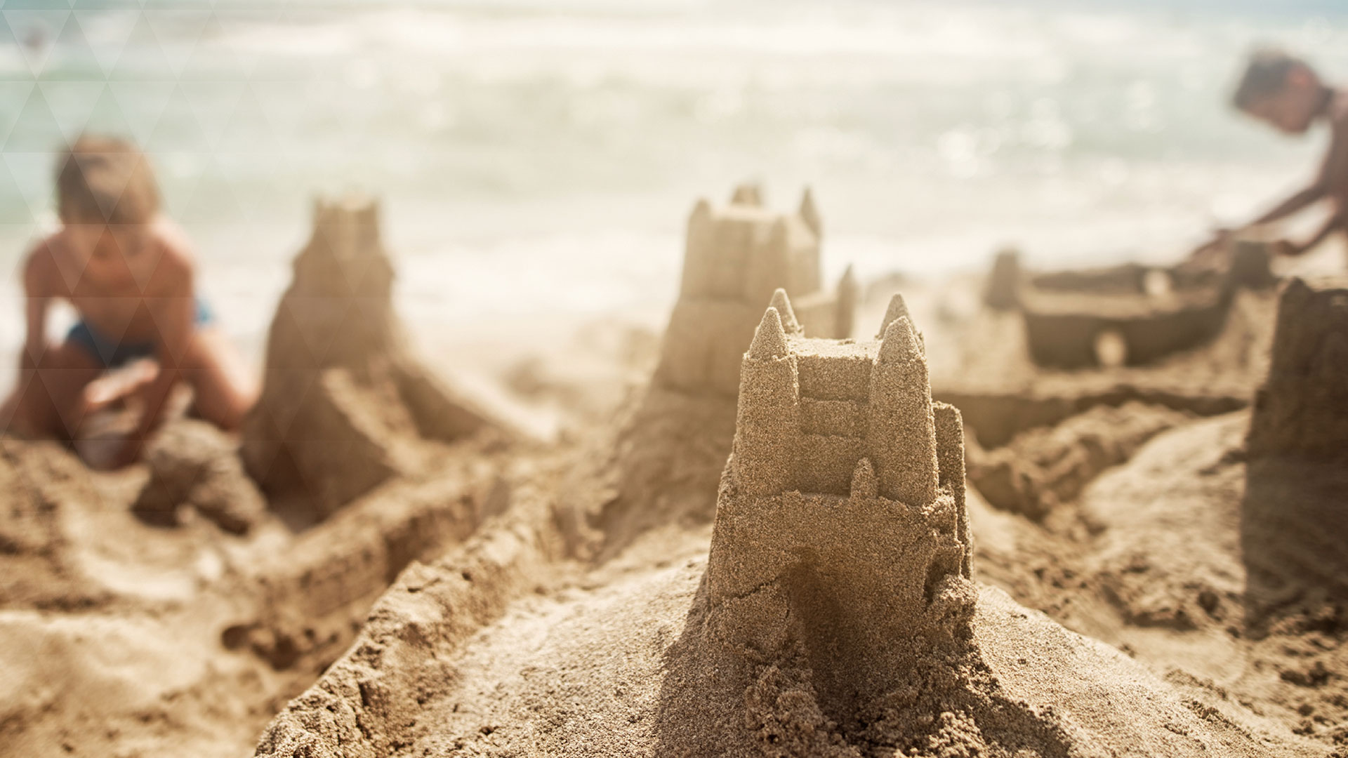 boern-leger-i-sand